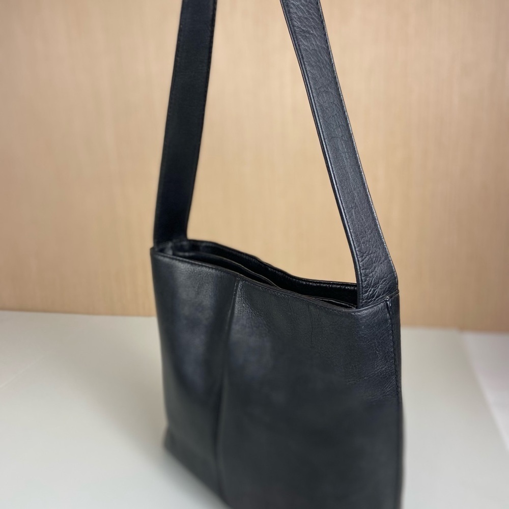 HOBO International genuine leather shoulder bag in classic black.